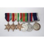 A WWII group of six: 1939-45 Star, Africa Star, Italy Star, Defence Medal, War Medal, & the Royal