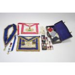 Eleven various enamelled Masonic regalia medals; two ditto aprons; various items of Masonic