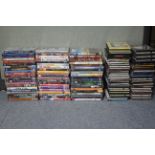 Approximately two hundred various CDs & DVDs.