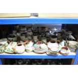 A collection of Torquay pottery motto ware including jugs, bowls, candlesticks, etc., part w.a.f.