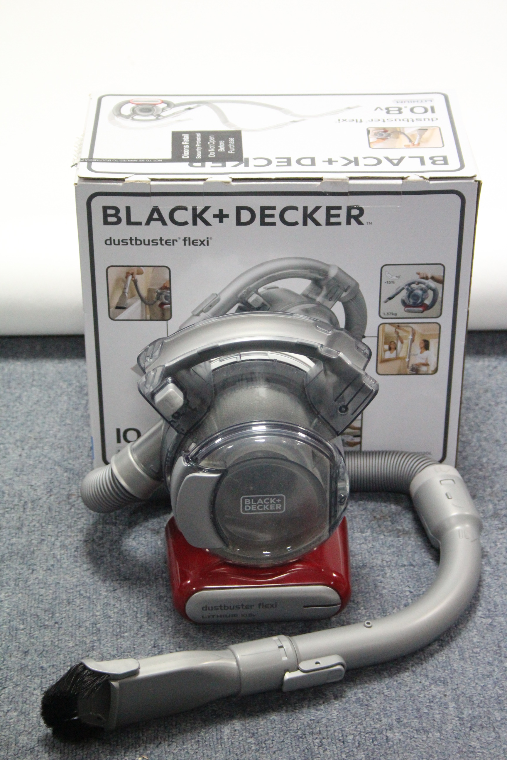 A Black & Decker “Dustbuster Flexi” hand held vacuum cleaner, w.o. – boxed.