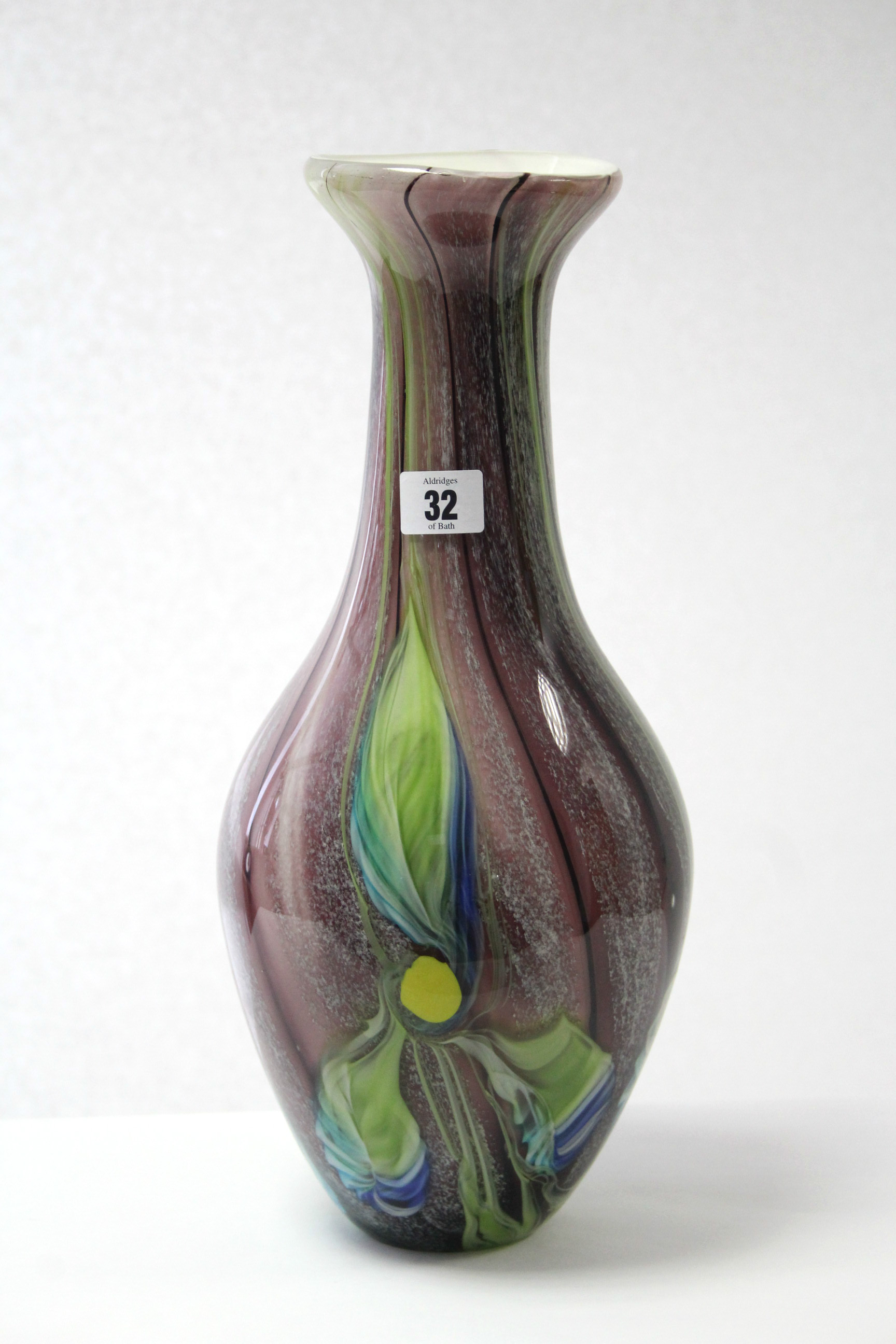 A large art-glass vases of ovoid form & with multi-coloured stylised floral design, 15¾” high.