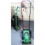 A Qualcast lawn mower; & a ditto garden strimmer, both w.o.