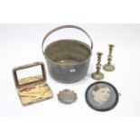 A brass preserve pan with iron overhang handle, 13¾” diam.; a pair of brass candlesticks; & sundry