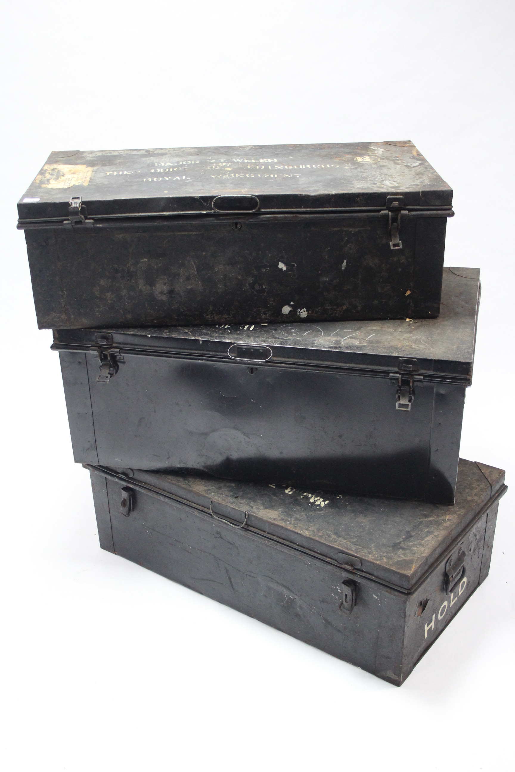 Three japanned-metal travelling trunks, each inscribed “Major R. T. Welsh, Royal Engineers”, 36”,