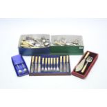 Various items of plated & stainless steel cutlery, cased & un-cased.