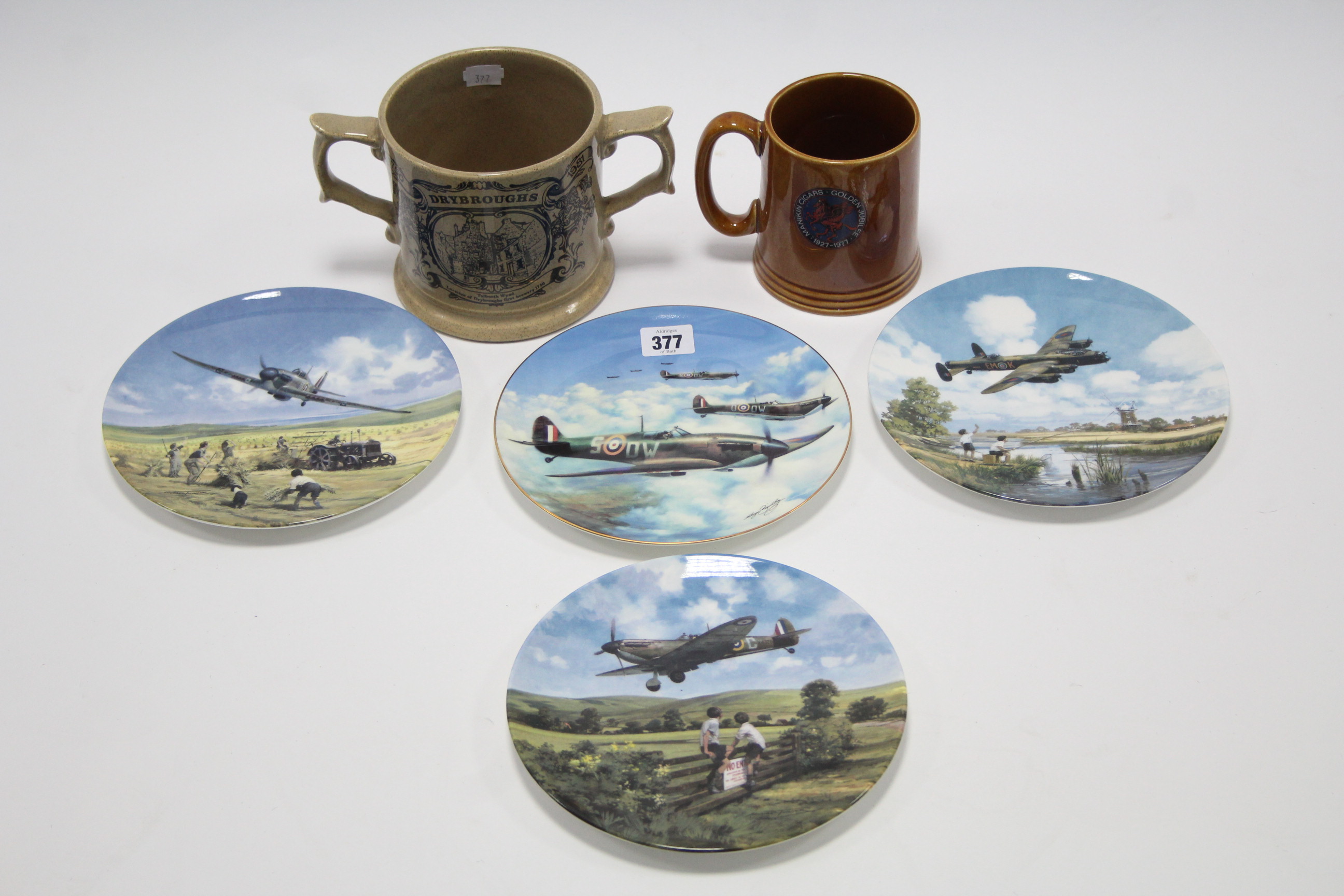 Four various collector’s plates, each depicting R. A. F. aeroplanes; a Wade pottery two-handled