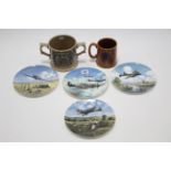 Four various collector’s plates, each depicting R. A. F. aeroplanes; a Wade pottery two-handled