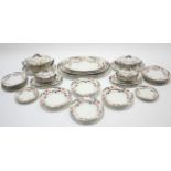 A late Victorian Leighton pottery floral decorated forty-three piece part dinner service including a