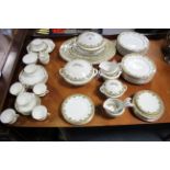 A Wedgwood & Co. Imperial china “Britanny” pattern forty-nine piece part dinner service; & a Cauldon