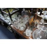 A pair of heavy cut-glass square decanters; two glass yacht decanters; & various other items of