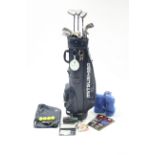 A matched set of thirteen golf clubs; & a Mitsushiba golf club bag.
