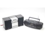 A Panasonic CD stereo system; & a ditto portable stereo CD player, both w.o.