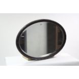 An Edwardian mahogany frame oval wall mirror with beaded edge & inset bevelled plate, 22½” x