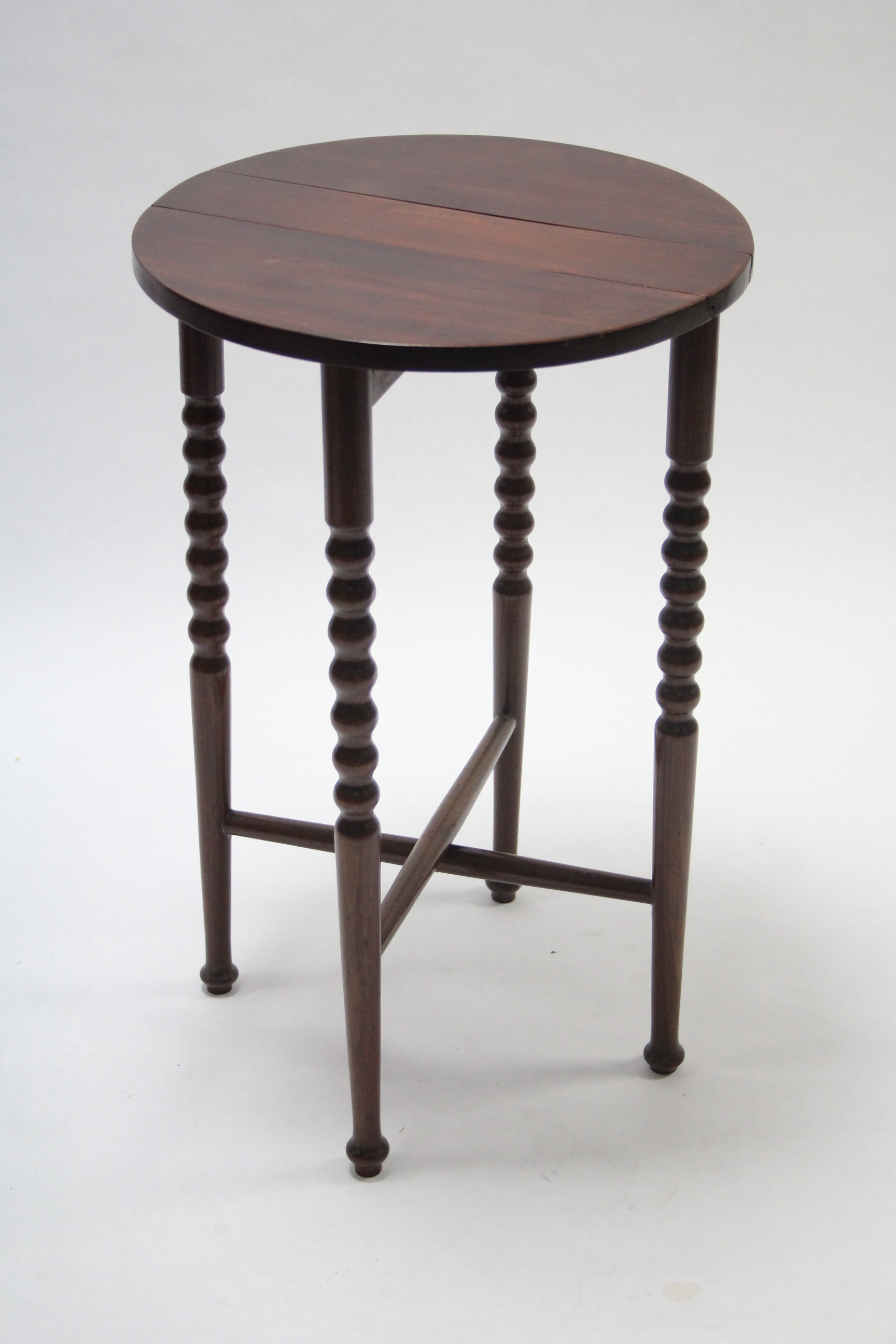 A mahogany nest of five occasional tables (four under one), the smaller tables with circular drop - Image 3 of 3