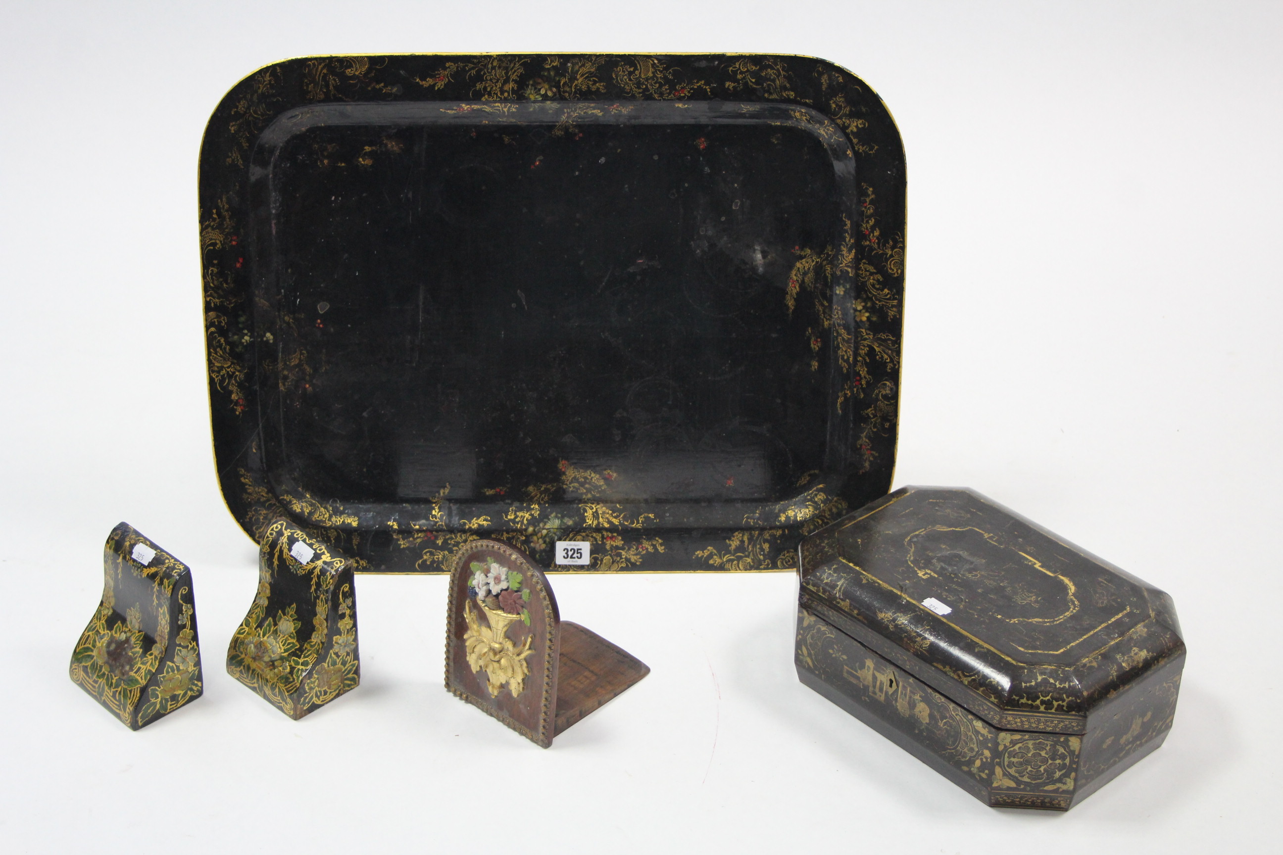 A Tôleware-type rectangular tea tray of black ground & with gold & multi-coloured foliate design,