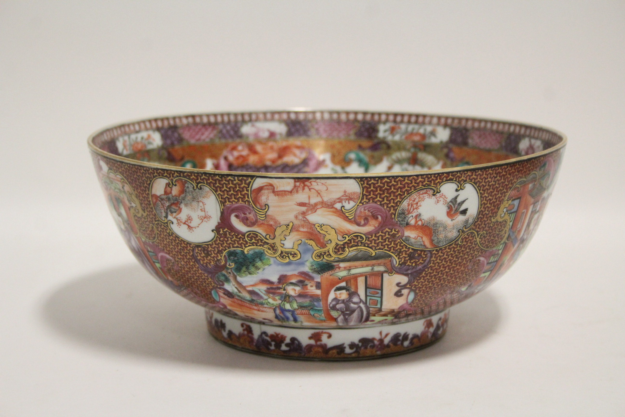 An 18th century Chinese porcelain "Mandarin" pattern punch bowl; 11¼" diam. (cracked). - Image 2 of 5