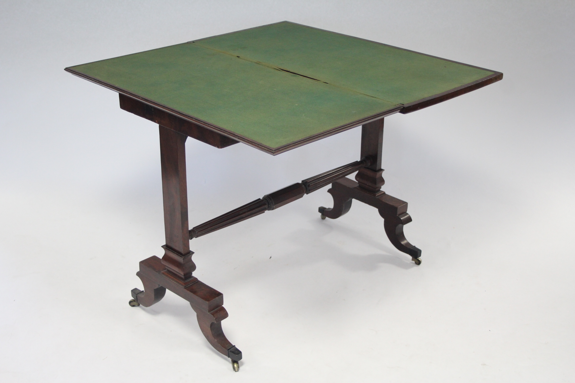 A late 19th century mahogany card table, with rectangular fold-over top on two end supports joined - Image 3 of 4