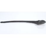 An African carved wood long-handled ladle with shaped bowl; 30" long.