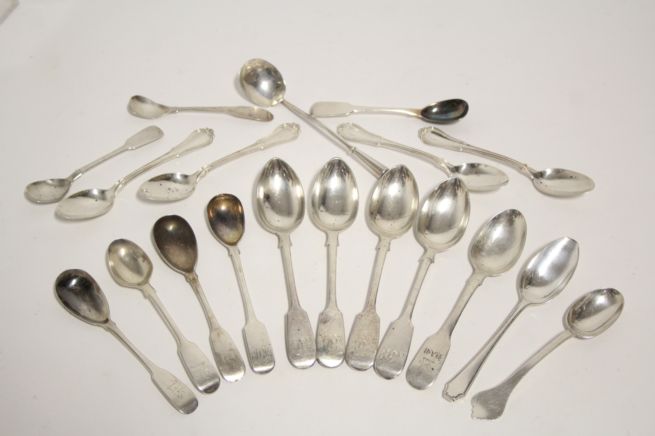 Eleven various Georgian, Victorian, & later teaspoons; & eight condiment spoons – odd dates &