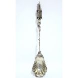 A continental service spoon with lobed oval bowl, a putto figure to the long rococo stem, a