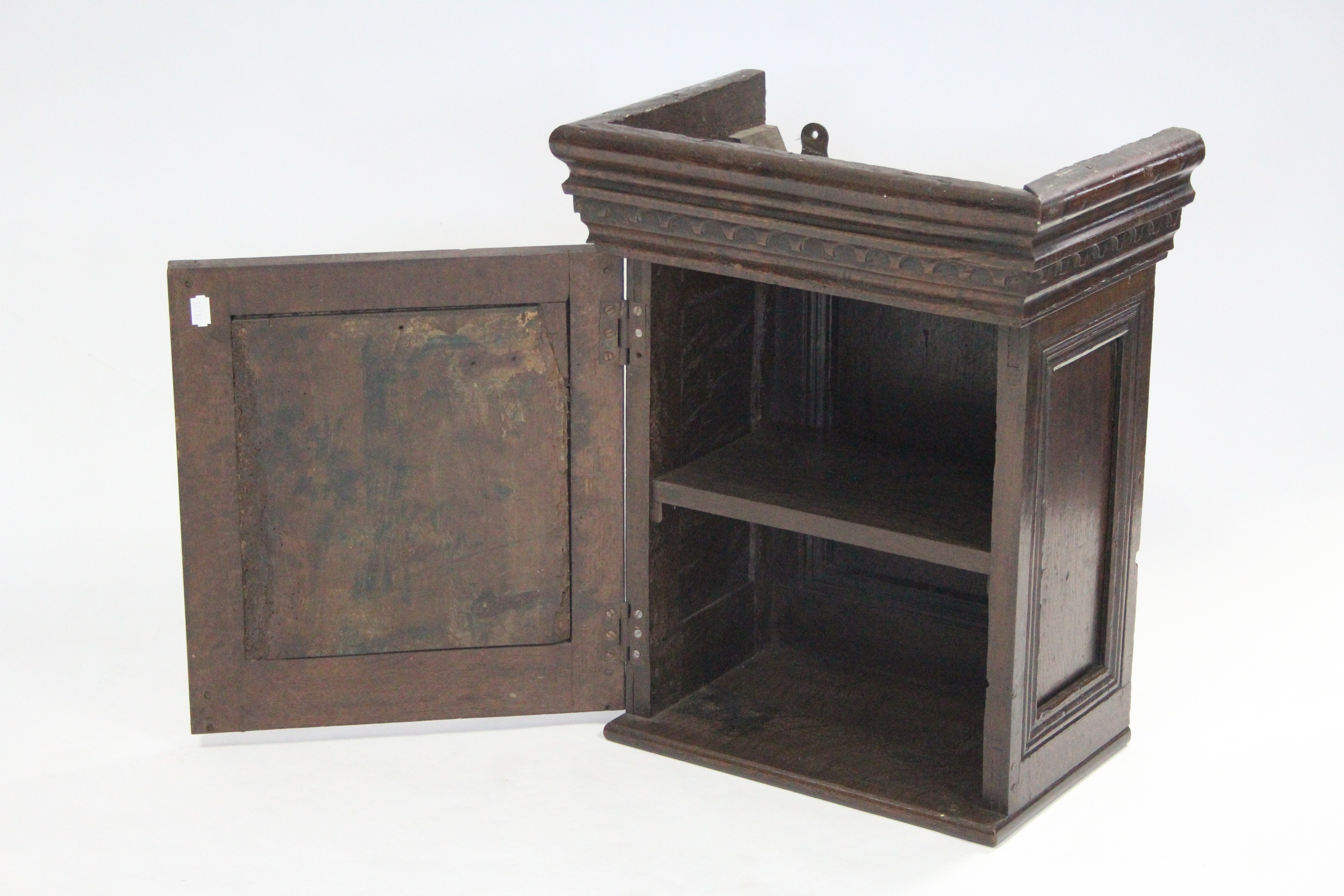 A 17th century style carved walnut & oak small cabinet enclosed by panel door with decoration of a - Image 3 of 3