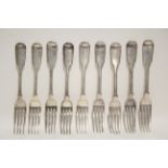Nine William IV Fiddle pattern table forks; London 1832, by William Eaton. (20 oz).