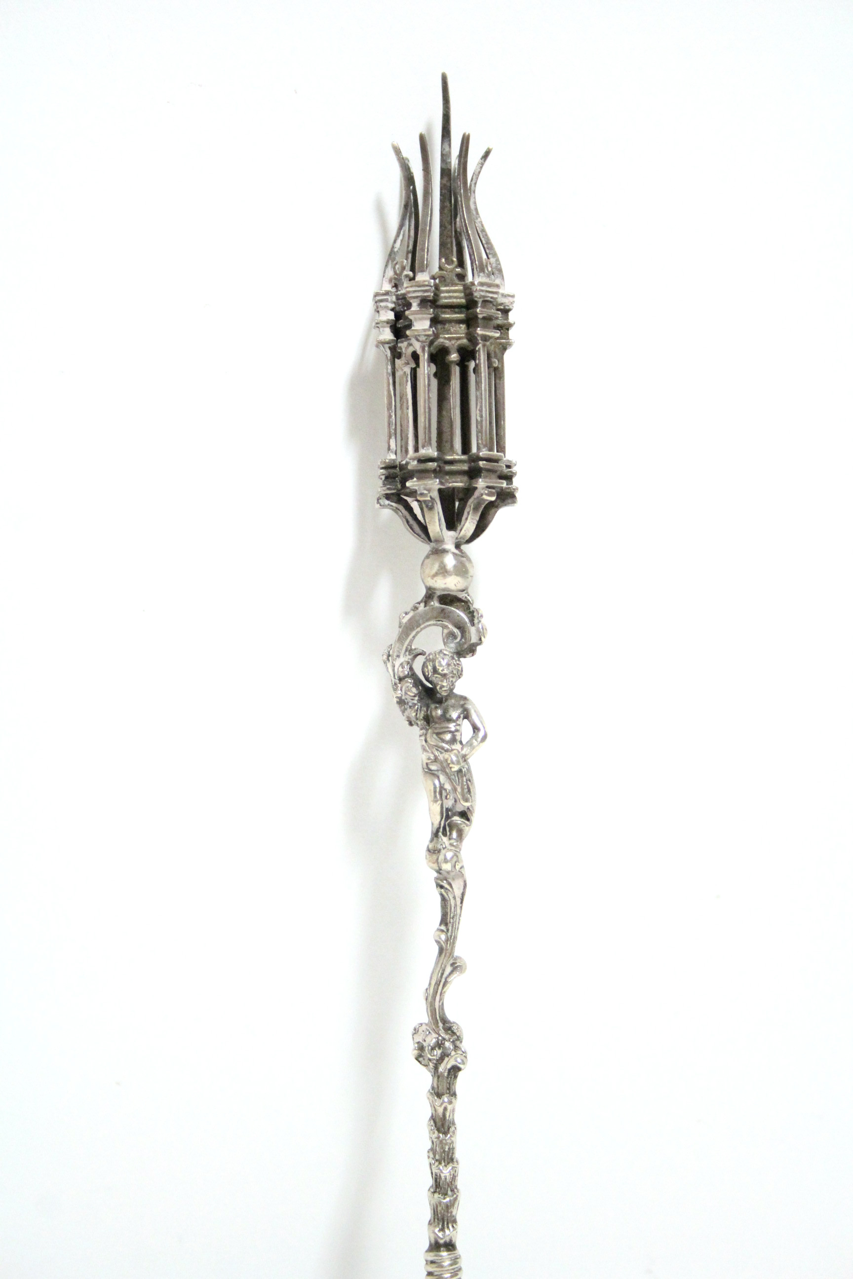 A continental service spoon with lobed oval bowl, a putto figure to the long rococo stem, a - Image 3 of 4