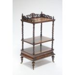A Victorian walnut three-tier whatnot with carved & pierced gallery, barley-twist supports, fitted