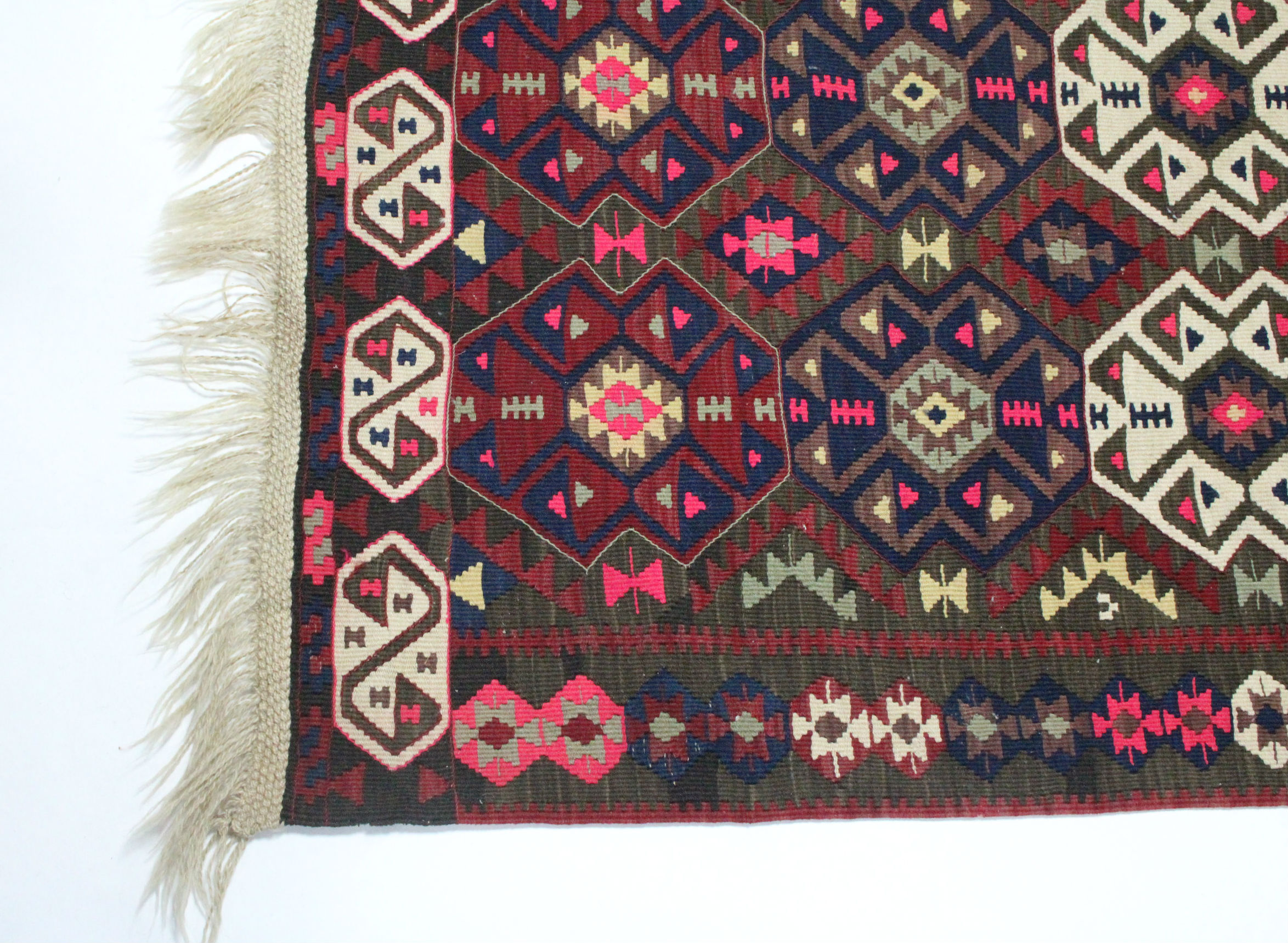 A Kelim rug with all-over brightly coloured geometric pattern & centre seam; 7’3” x 5’10”. - Image 2 of 4
