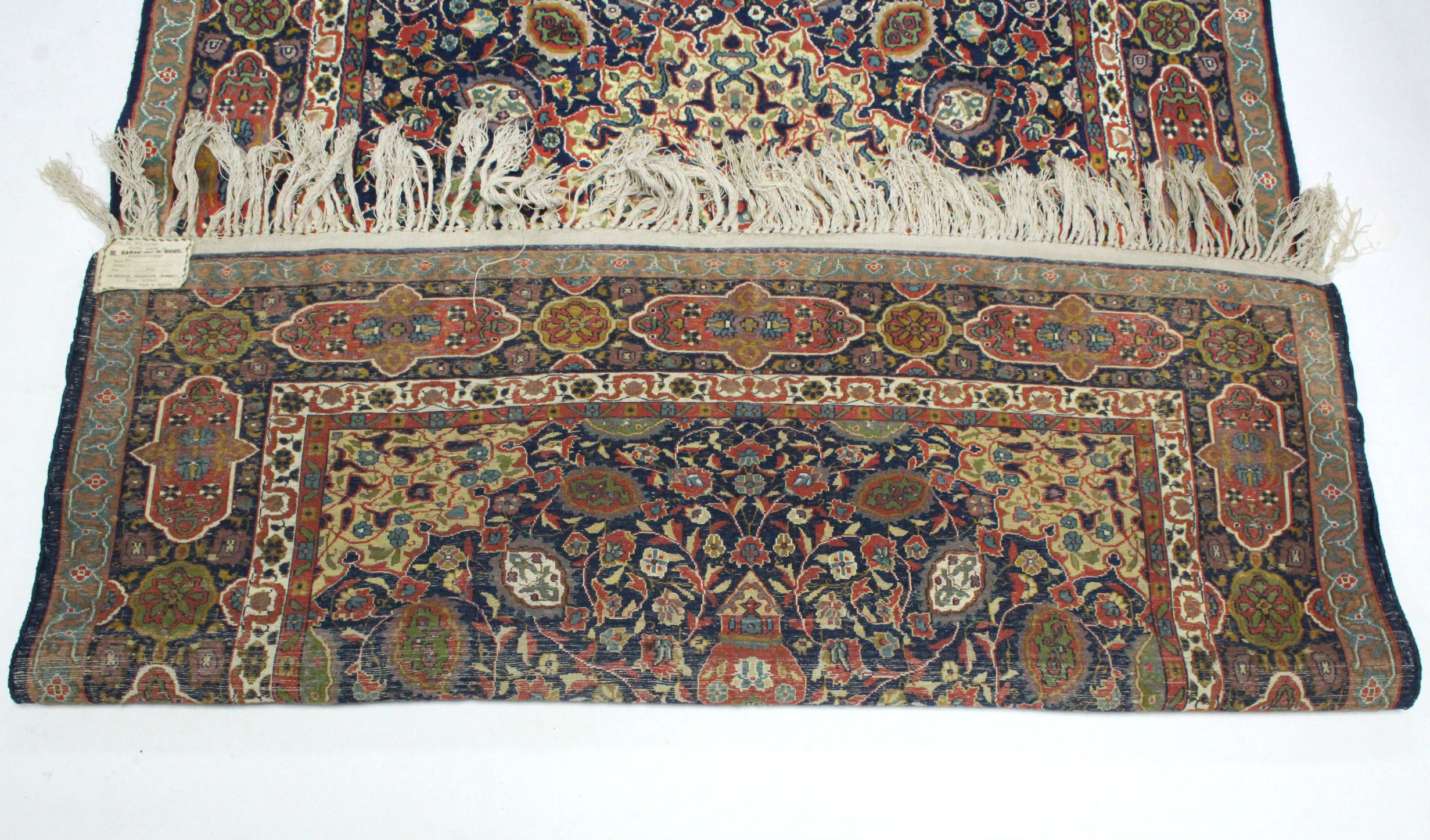 A Kashmir rug of deep blue ground, with centre medallion & all-over multicoloured floral design - Image 2 of 3