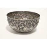 An Indian 4¾" diam. deep bowl embossed with mythical beasts & leaf-scrolls.