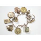 A 9ct. gold chain-link charm bracelet with pendant Edwardian half-sovereign (1901), eight various