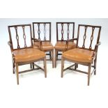 A set of eight early/mid-20th century dining chairs, including two carvers, with pierced rail-backs,