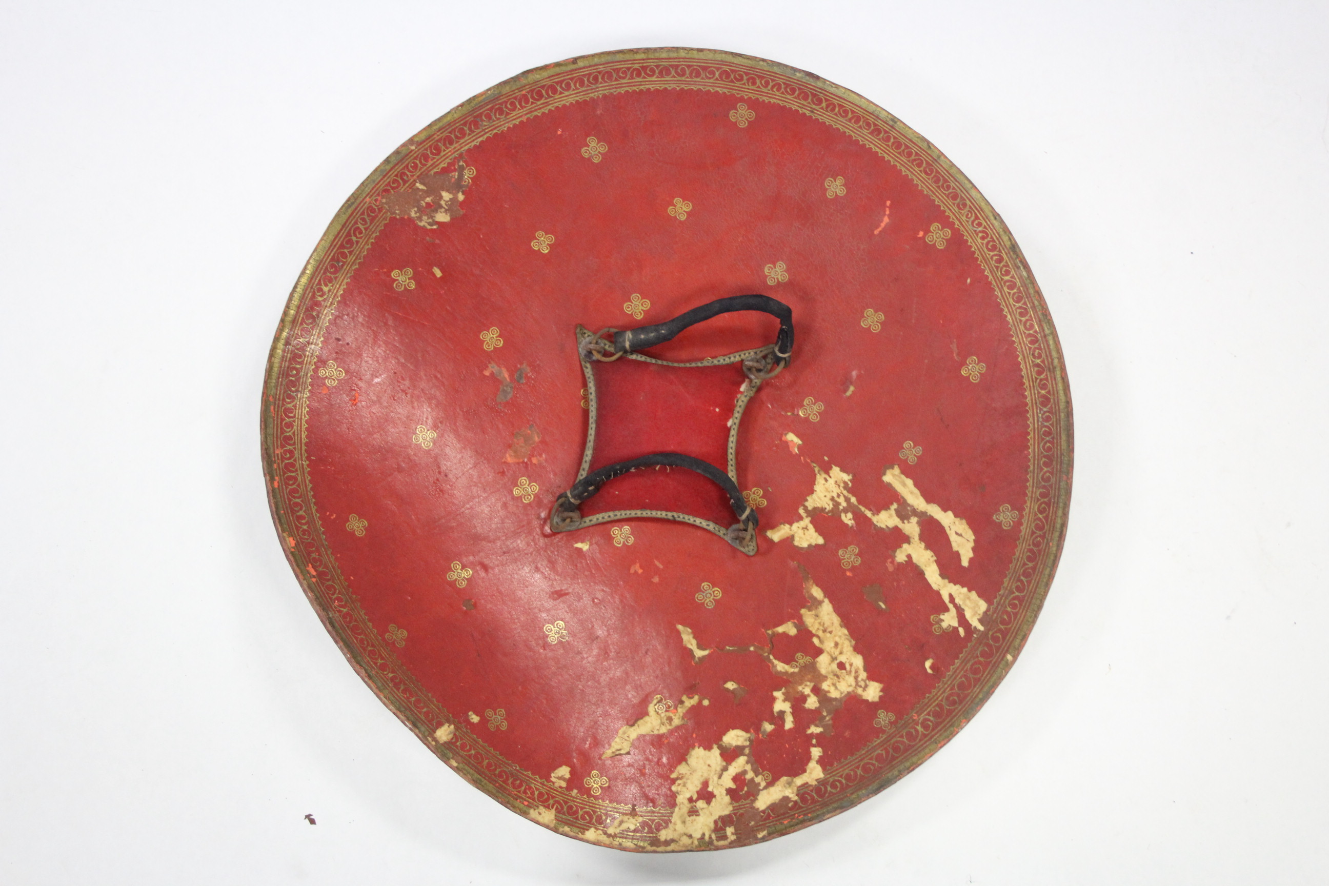 An eastern leather circular shield with four metal bosses & a hair-tuft to the centre; 26" diam. - Image 2 of 2