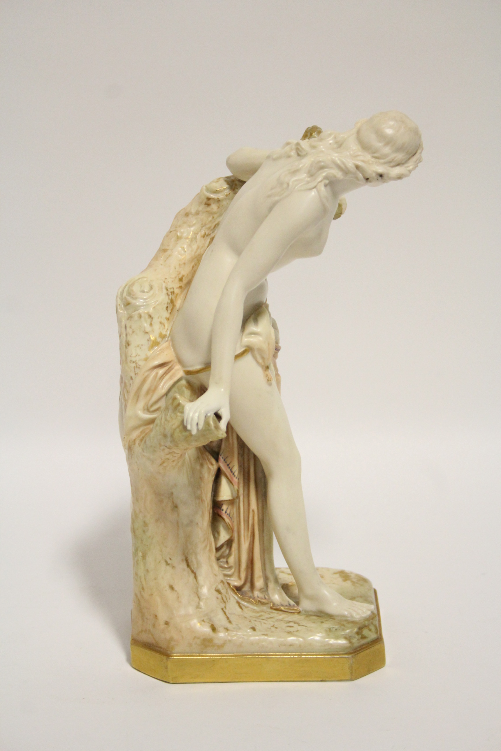 A Royal Worcester ivory-ground porcelain figure of "The Bather Surprised", the robes & tree trunk - Image 2 of 4