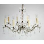 A moulded & cut-glass chandelier with baluster centre column and eight curved arms with pendant