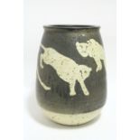 A large studio pottery stoneware vase of round tapered form & decorated with leopards; 14" high,