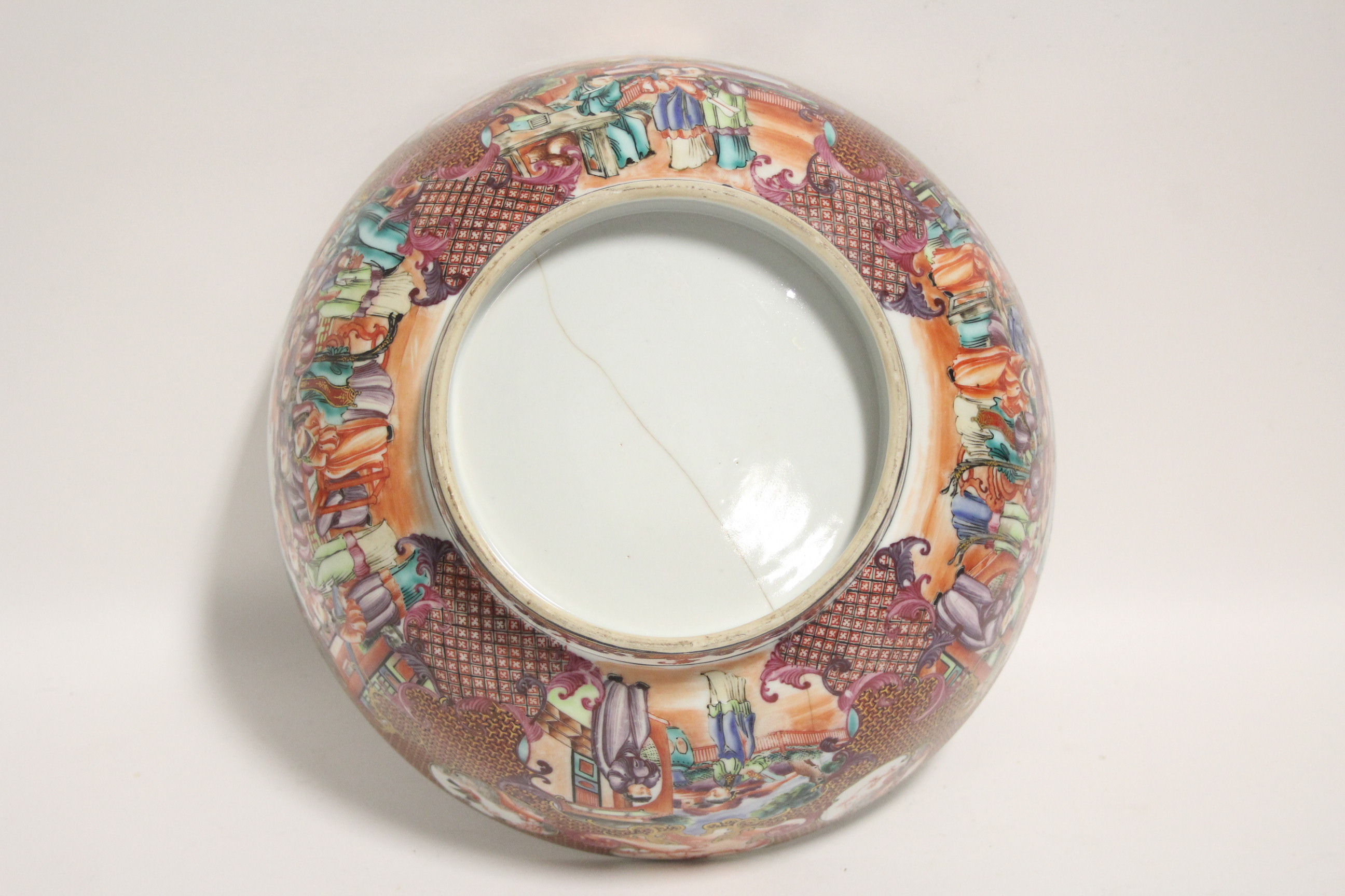 An 18th century Chinese porcelain "Mandarin" pattern punch bowl; 11¼" diam. (cracked). - Image 5 of 5
