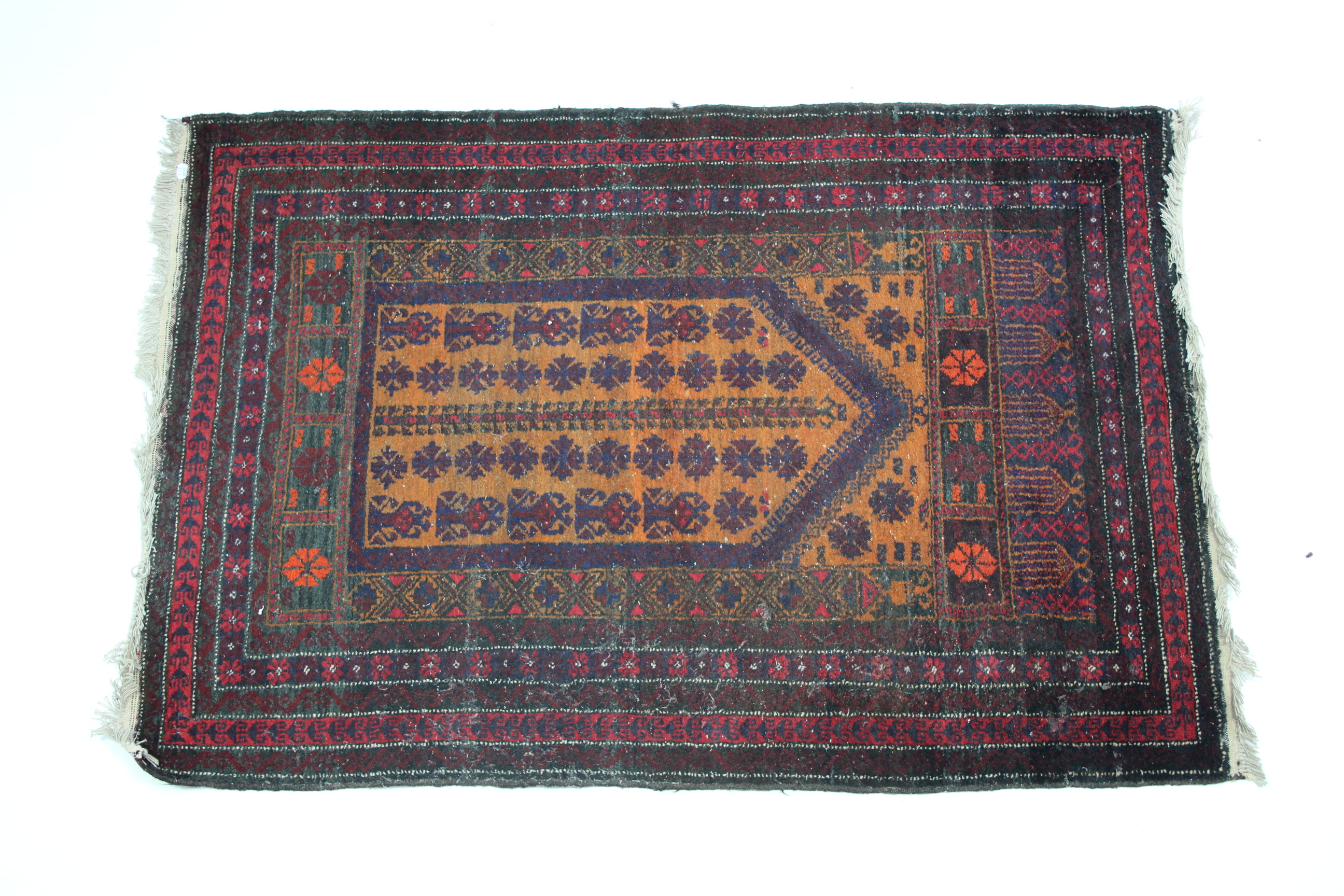 A Persian prayer rug with orange ground centre & repeating stylised floral motifs within crimson