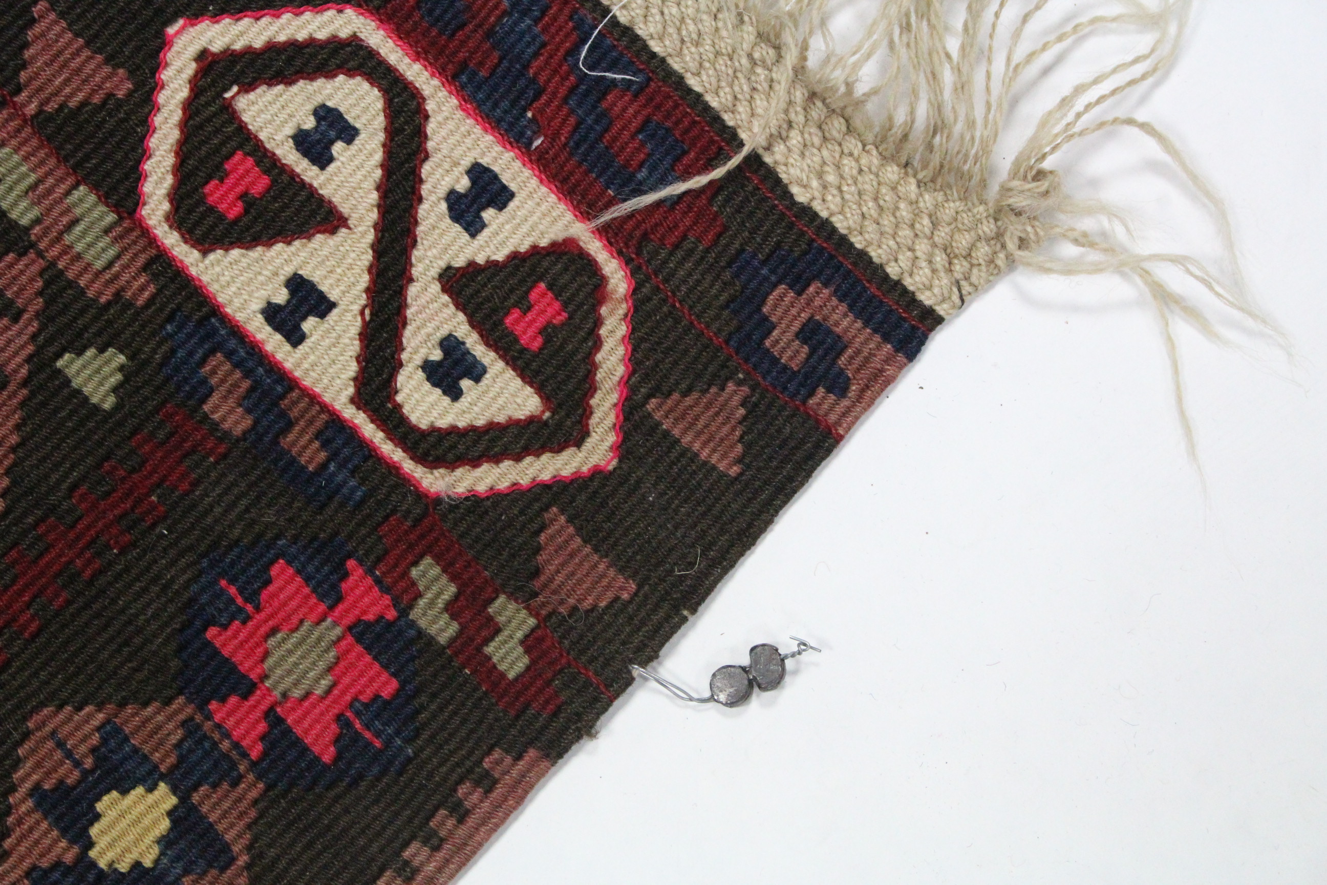 A Kelim rug with all-over brightly coloured geometric pattern & centre seam; 7’3” x 5’10”. - Image 4 of 4