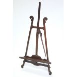 A late 19th/early 20th century mahogany table-top picture easel; 32" high.