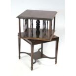 A 19th century mahogany small square revolving bookcase with central turned column, each side with