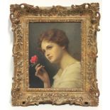 SIEFERT, Alfred (1850-1901). A head-&-shoulders portrait of a young lady holding a pink rose.