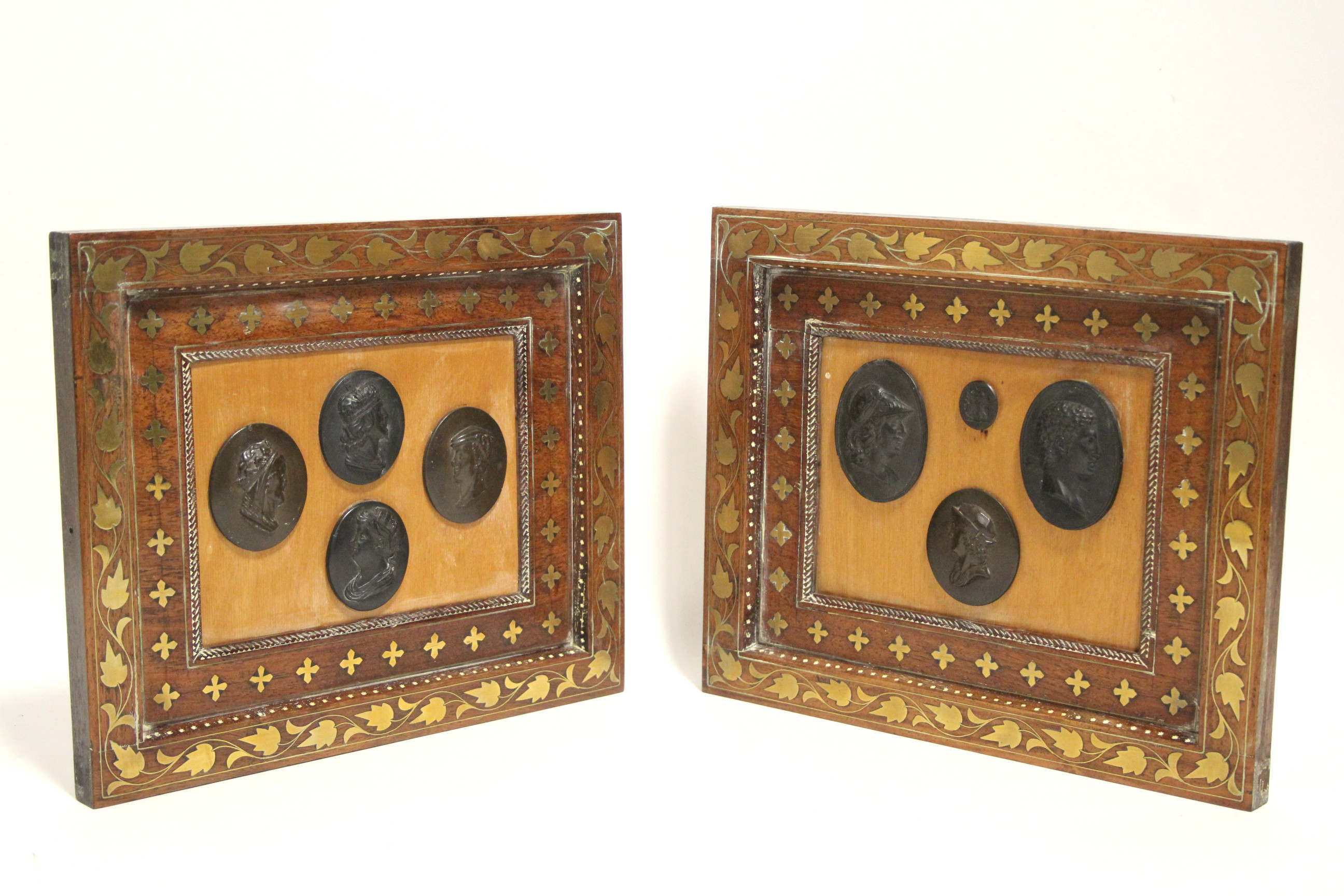 A group of seven late 18th/early 19th century black basalt oval male portrait medallions & one ditto