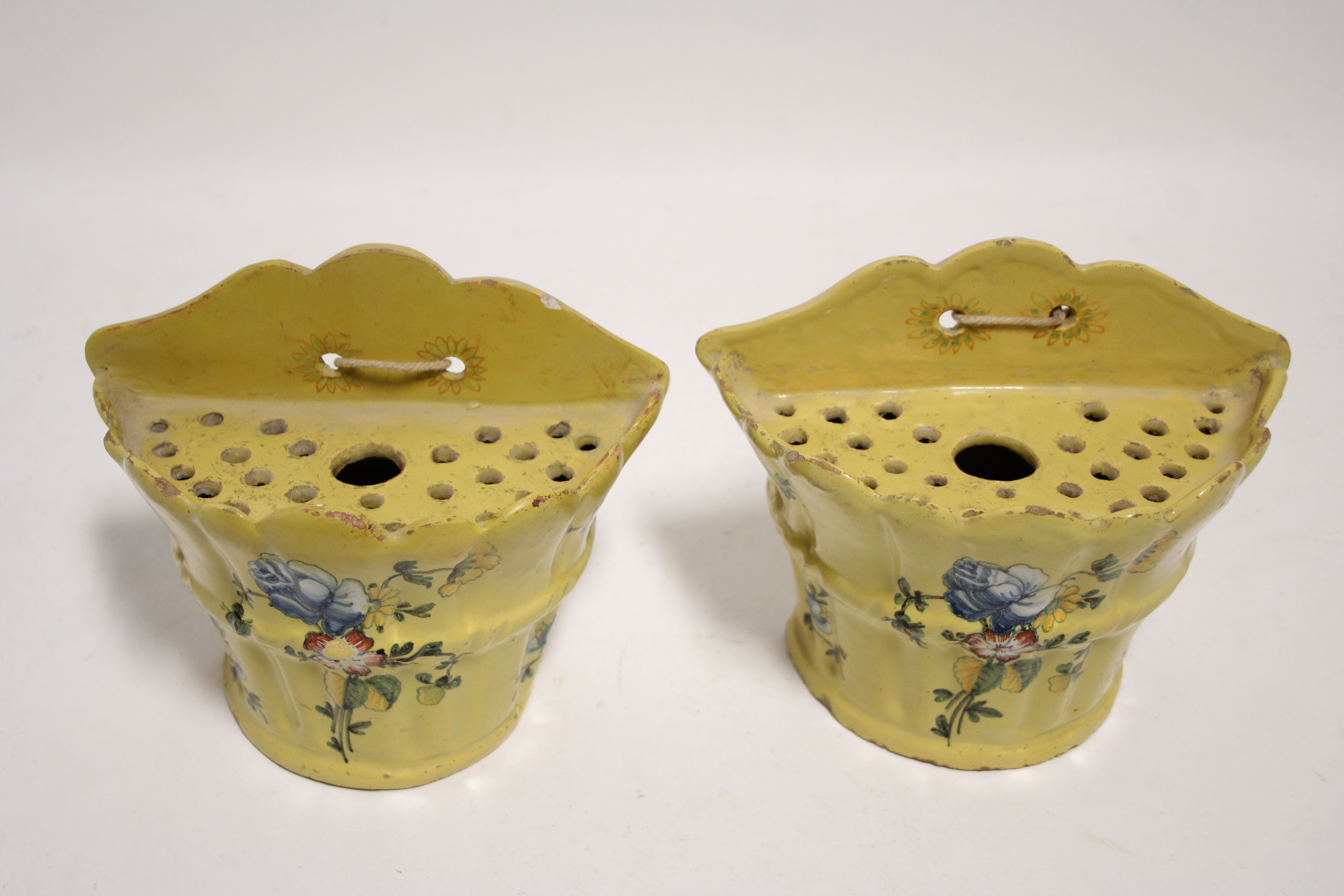 A pair of 18th century French yellow-ground faience bough bots of flared half-round form, each - Image 2 of 3