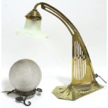 A continental Art Nouveau brass desk lamp with Vaseline glass shade, 16" high; & another lamp with