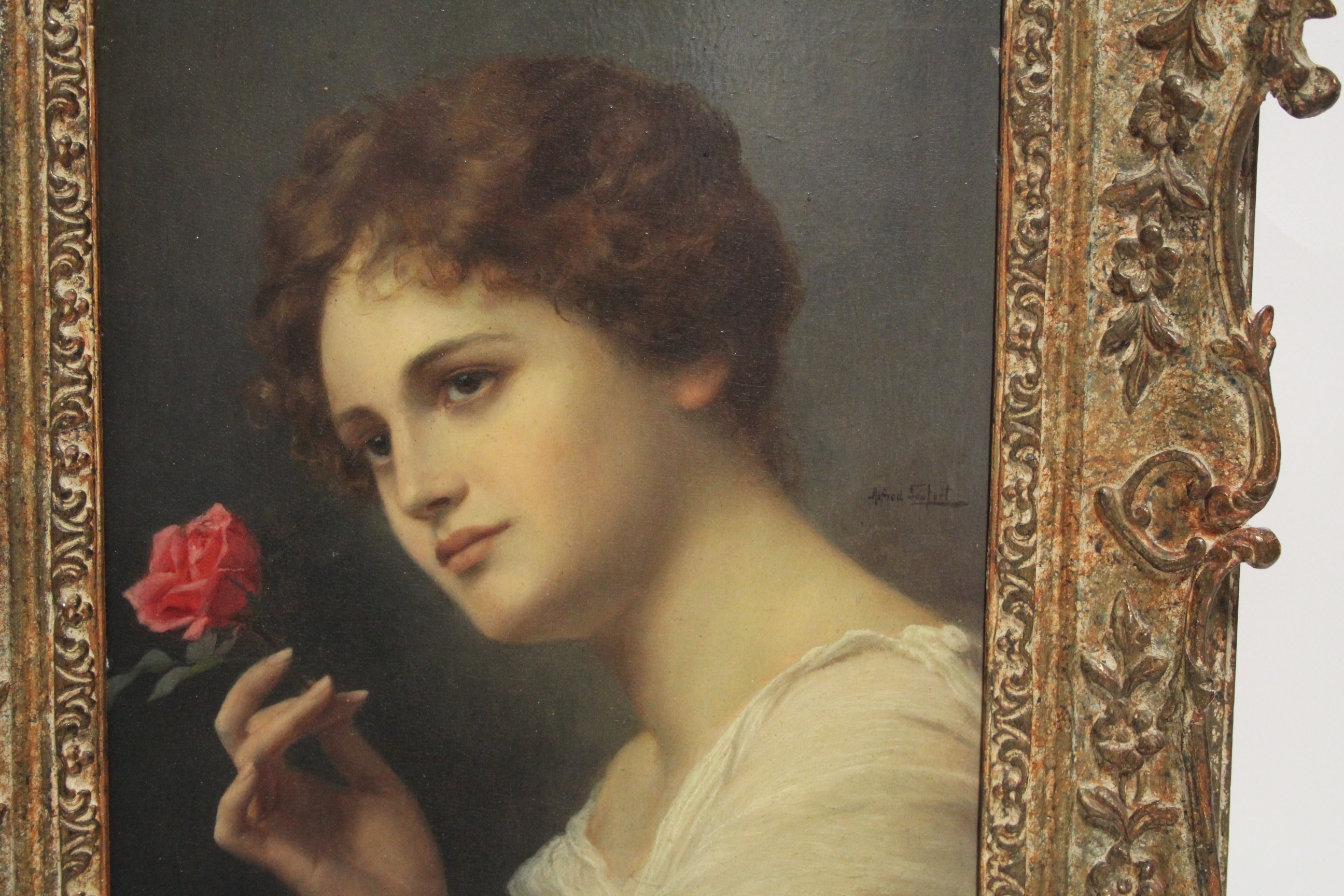 SIEFERT, Alfred (1850-1901). A head-&-shoulders portrait of a young lady holding a pink rose. - Image 4 of 5