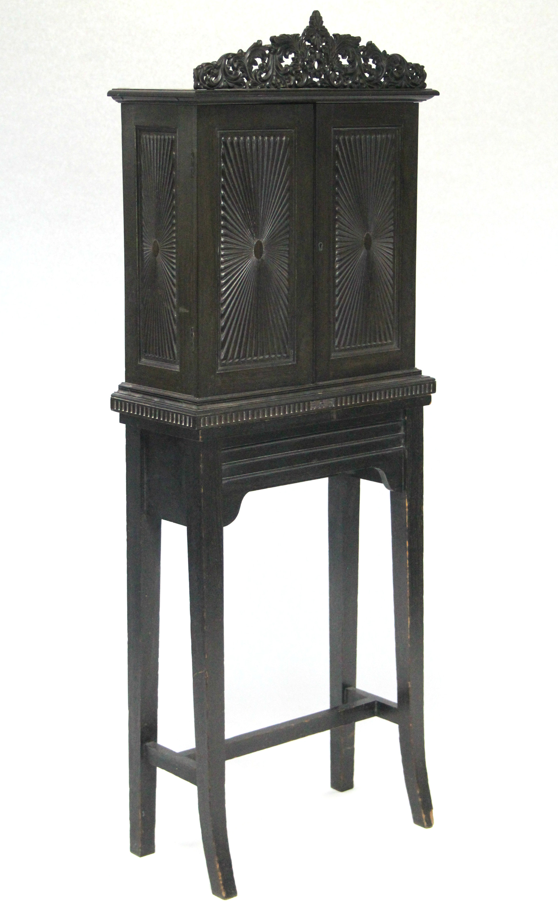 A 19th century INDO-PORTUGUESE COROMANDEL TABLE CABINET in the 17th century style, fitted fifteen