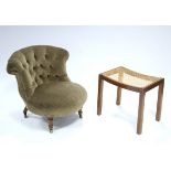 A Victorian mahogany frame small nursing chair, the circular seat & shaped buttoned back upholstered